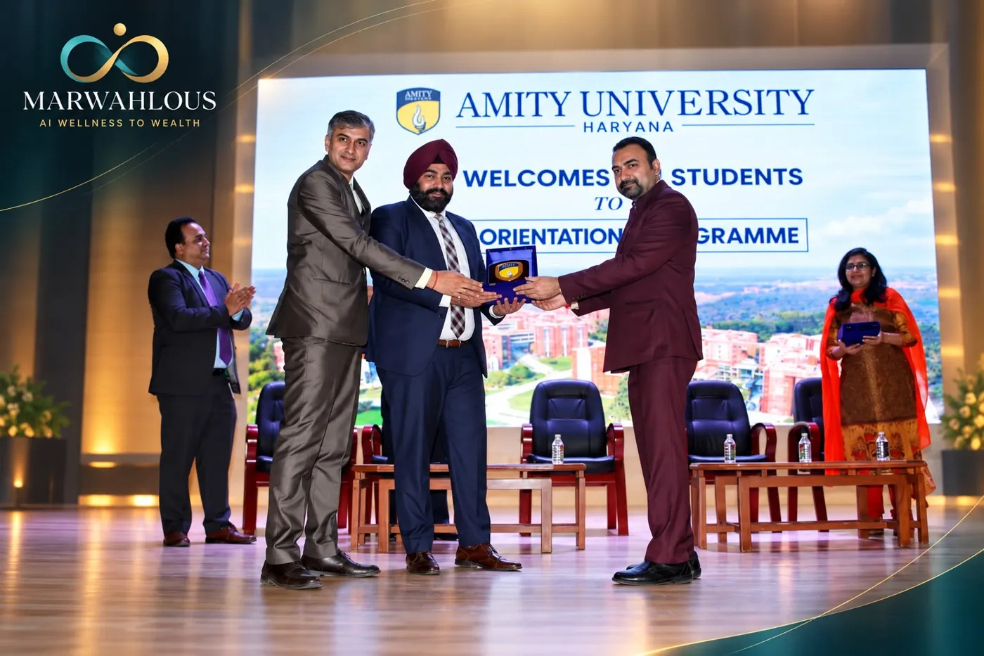 Dr. Ravineet Singh Marwah on stage at the Amity University orientation programme